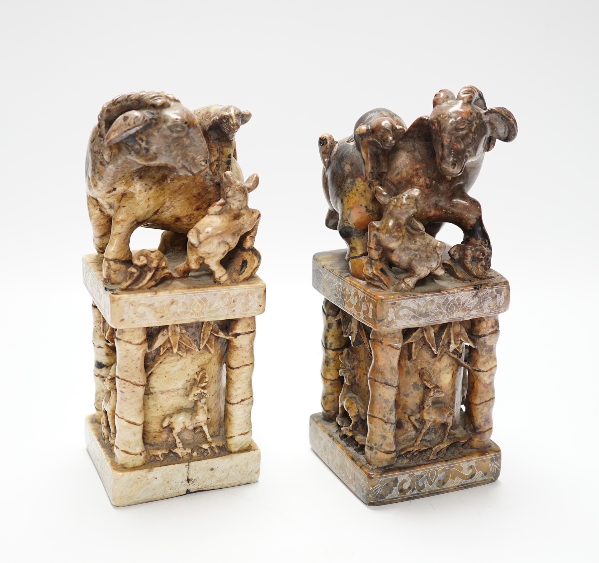 A pair of large Chinese soapstone 'ram' seals, 20cm
